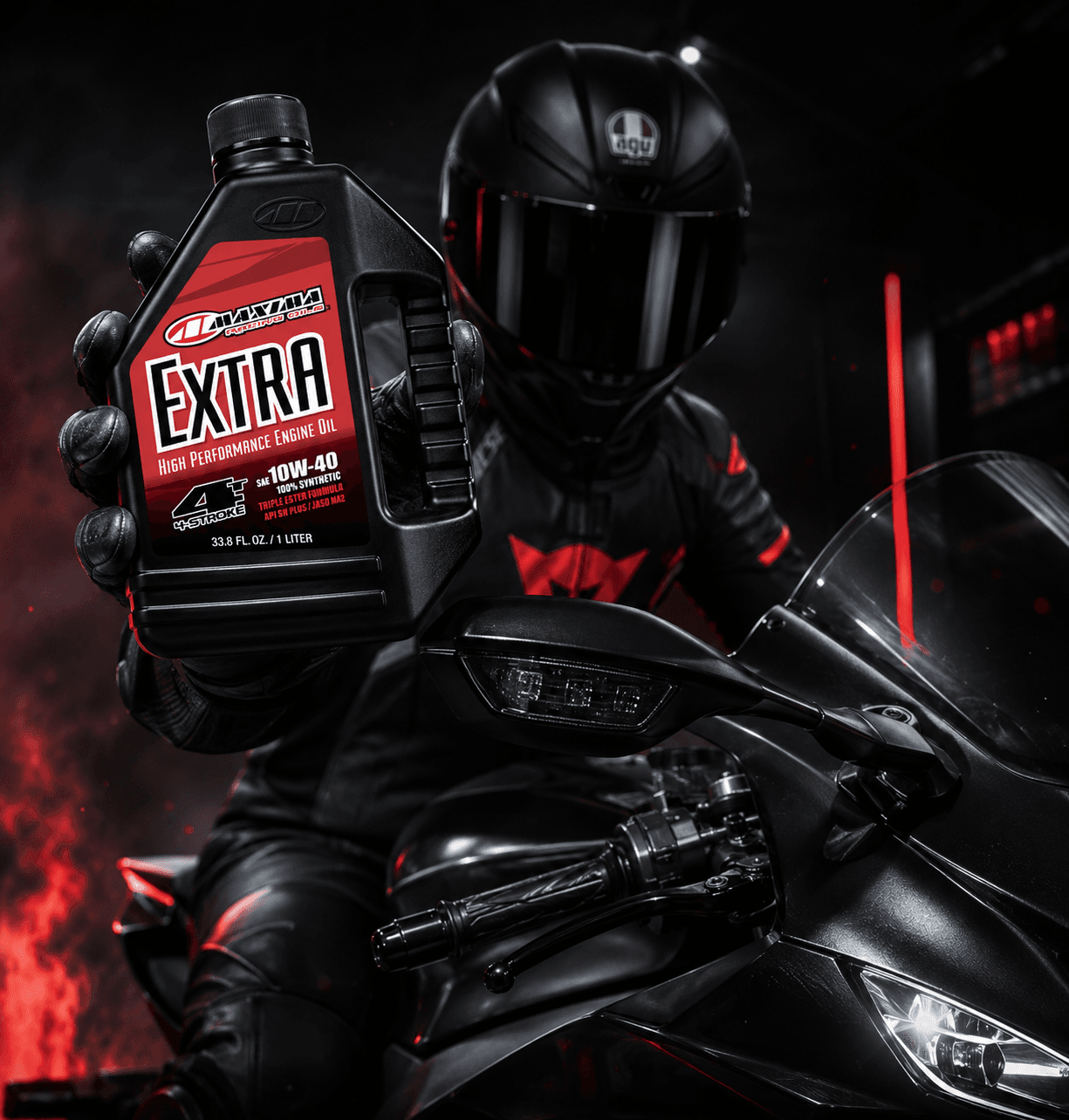 Rider holding a genuine bottle of Maxima Racing Oil